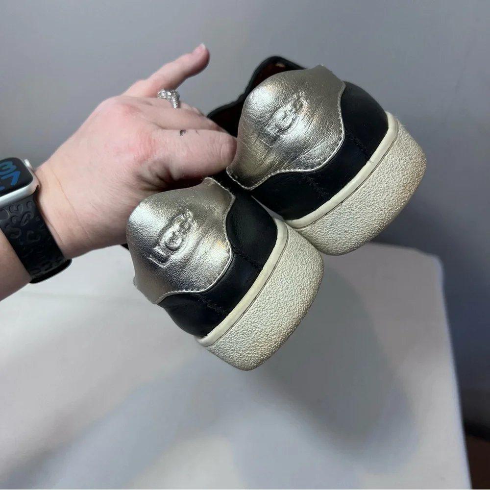 UGG Cas Slip-On Sneakers, which feature a black leather upper metallic heel 9